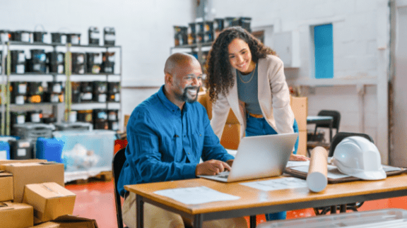 man-and-woman-looking-at-laptop