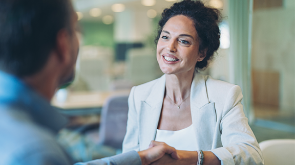 smiling woman in business setting