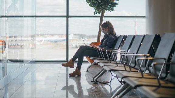 female business traveler at airport