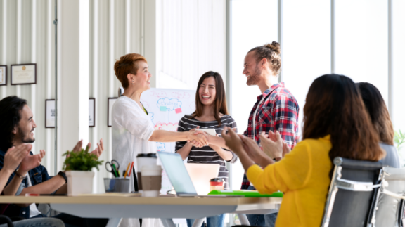 an employee being rewarded through an incentive program