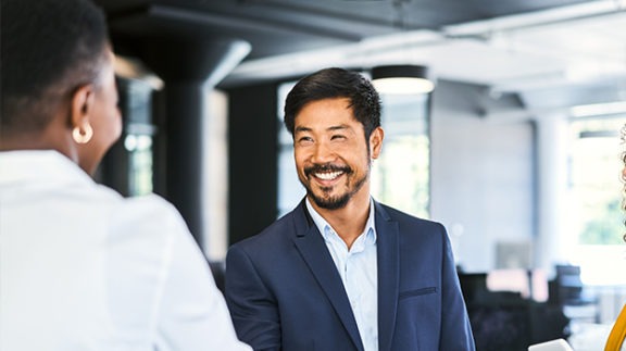 guy smiling and shaking hands