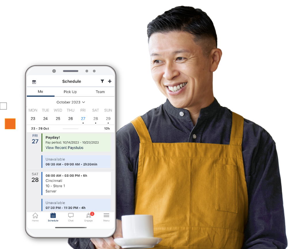 smiling restaurant worker in apron holding coffee cup